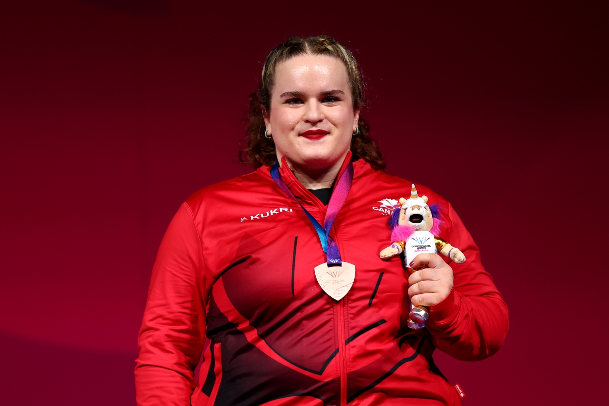 Etta Love with Bronze Medal