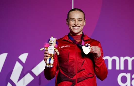 Ellie Black on the podium with a gold medal