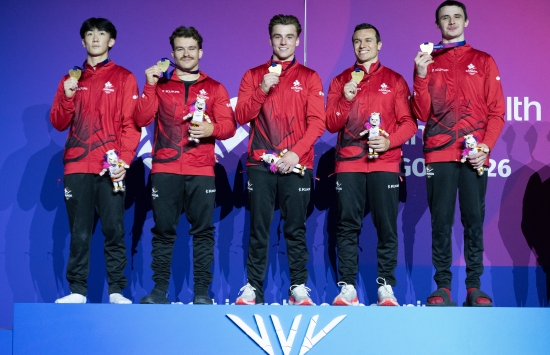 Canada Men's Gymnastics Team on the podium 