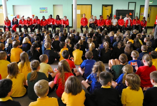 Team Canada athletes take questions from students at an elementary school in Dou