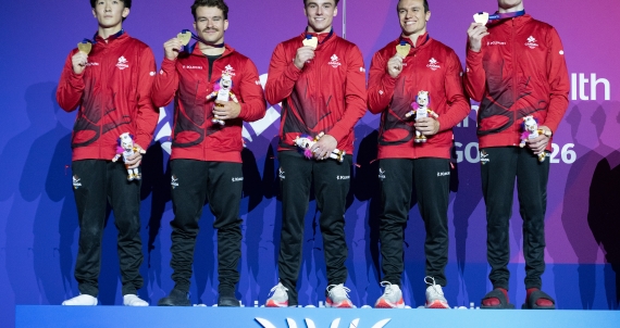 Canada Men's Gymnastics Team on the podium 