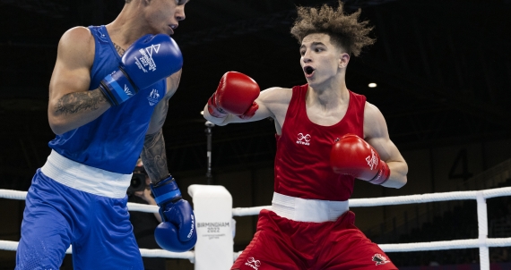 Two boxers in the ring at the 2022 Commonwealth Games